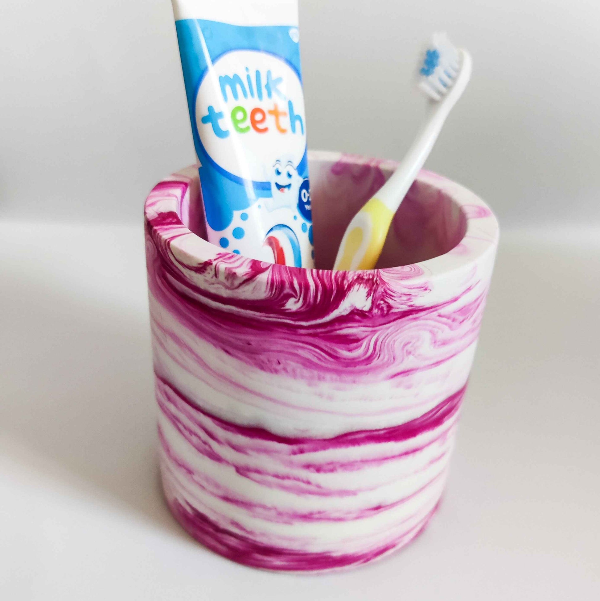 Half terrazzo vivid pink pen pot, marble toothbrush makeup brush holder