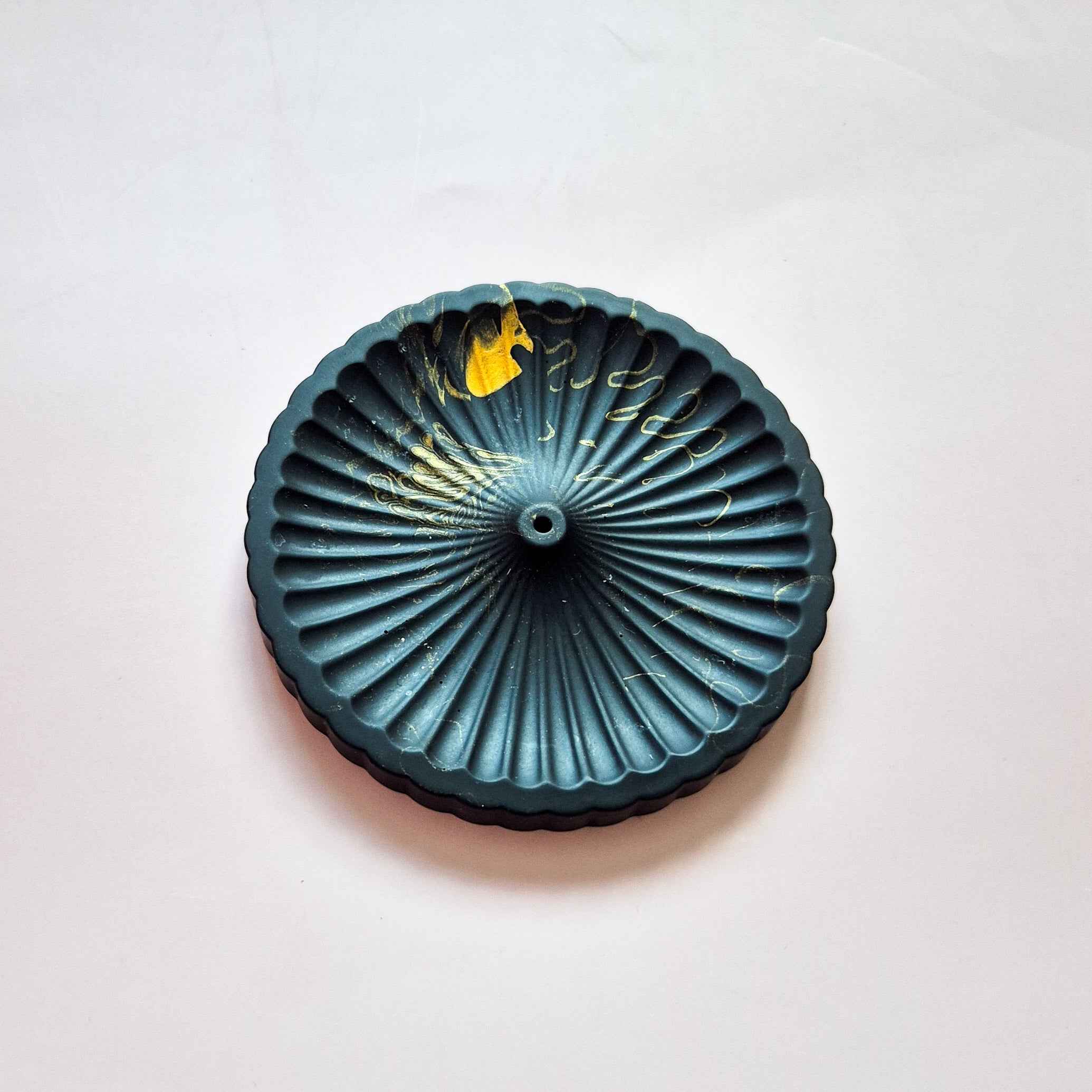 Round incense stick holder
