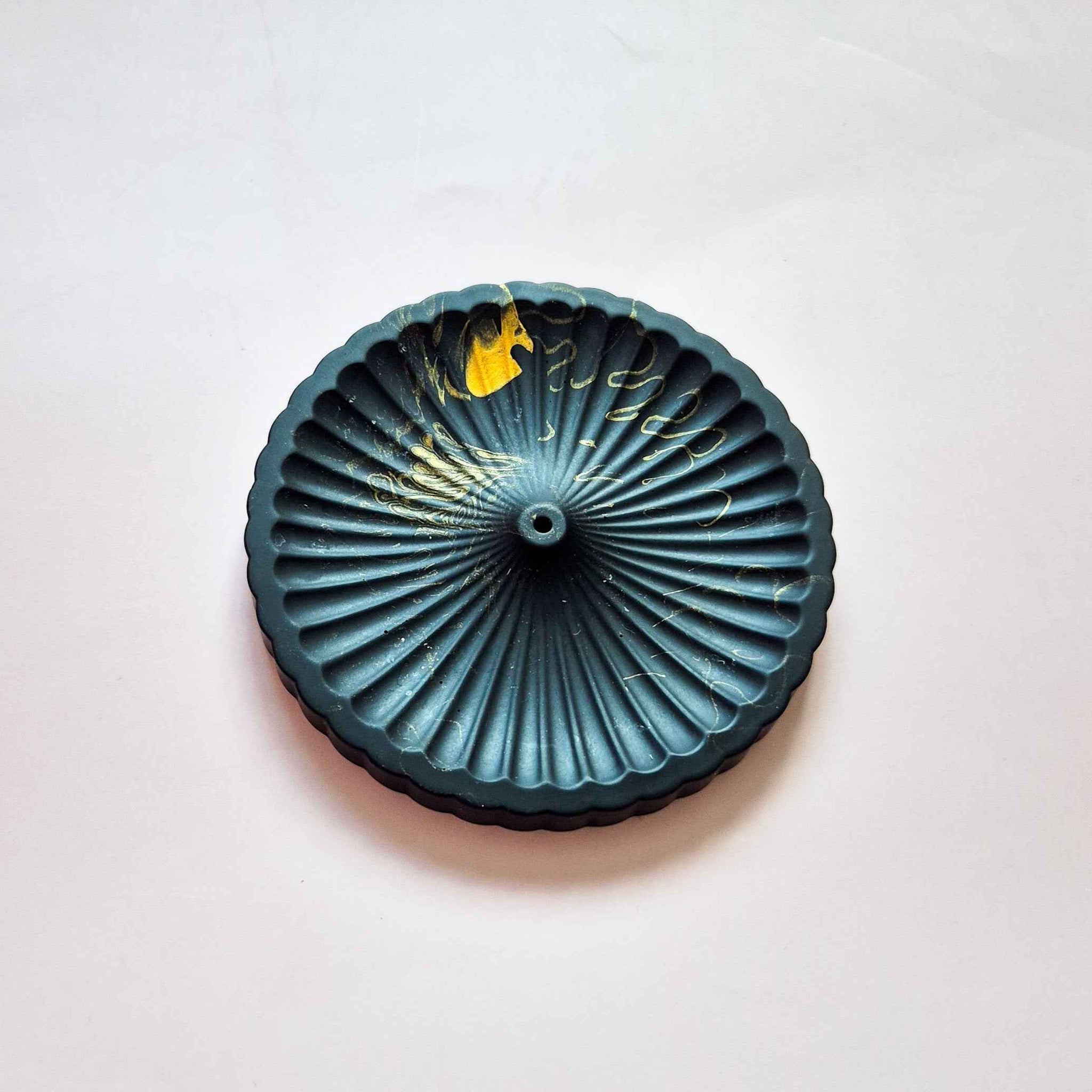 Round incense stick holder